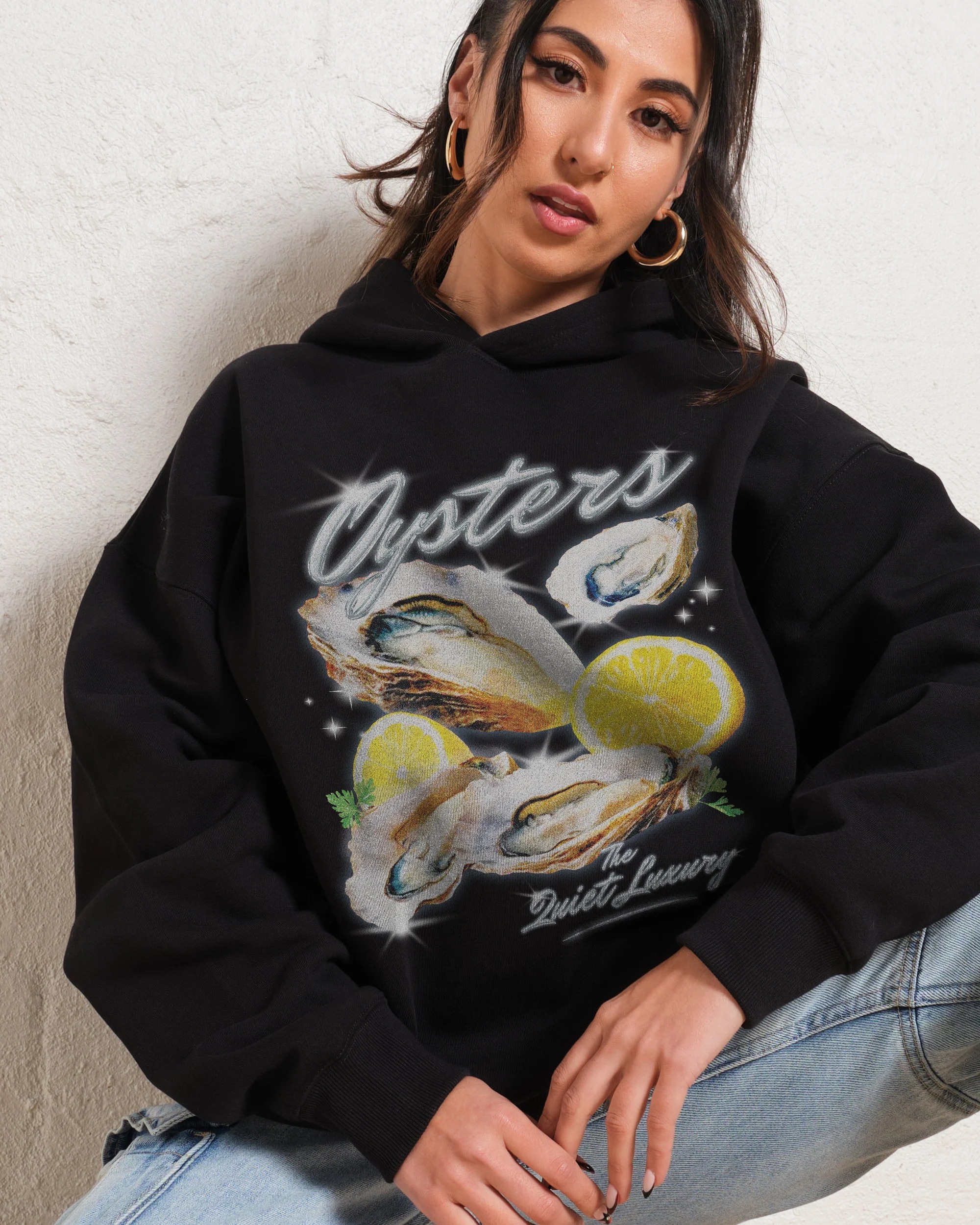 Black-Hoodie-Women-Front_9a582f5d-ead0-454d-b1c0-9ddfd5ec1aae